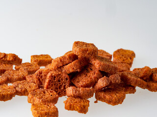 a piece of brown bread cookies on a white background