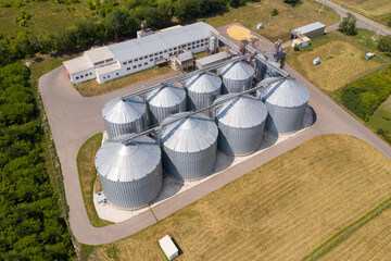 Aerial view of agricultural silos, grain elevator for storage and drying of cereals  © scharfsinn86