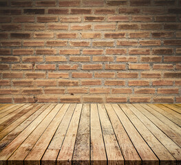 Old wood table with abstract old brick wall background for product display