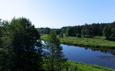 Fototapeta premium a summer landscape with river