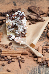 a multi-layered cake made of chocolate and cream cakes