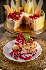Portion of layered creamy fruit cake