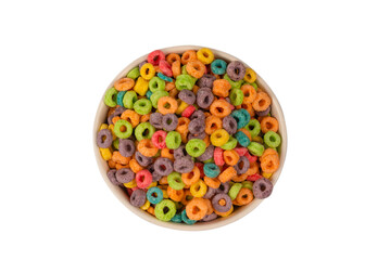 Colorful rings cereal spill out into a bowl. Breakfast. Isolated.