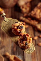 Small cakes with almonds, raisins, and honey.