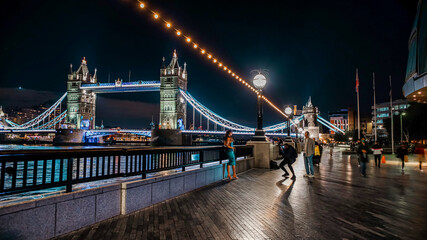 Obraz premium London Tower Bridge at Night in United Kingdom. One of London's most famous bridges and must-see landmarks in England