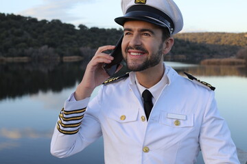 Ship captain making a phone call