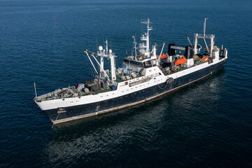 Fishing sea trawler at sea.
