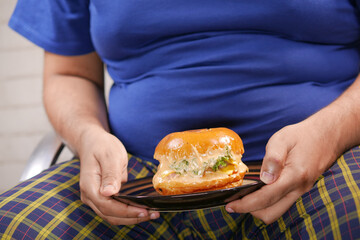 hungry man waiting for eating beef burger on table close up 