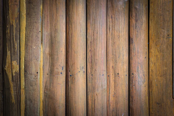 Old and weathered wood log wall of cabin for wood background and textured.