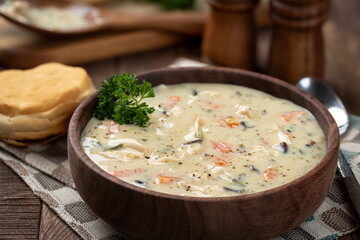 Bowl of creamy chicken and rice soup - obrazy, fototapety, plakaty