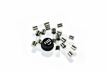 Electrical glass tube fuses isolated on white background top view