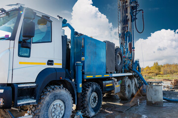 Drilling rig close-up at a construction site. Deep hole drilling. Extraction of minerals oil and gas. Working process.