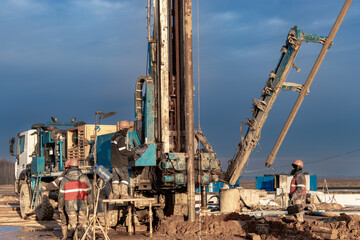 Drilling rig close-up at a construction site. Deep hole drilling. Extraction of minerals oil and...
