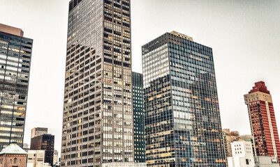 Fototapeta premium City skyscrapers against white background sky