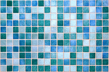 Colorful square mosaic tiles background pattern in soothing green blue teal aqua turquoise tones