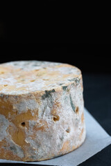 English Stilton cheese with blue mold.