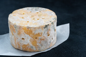 English Stilton cheese with blue mold.