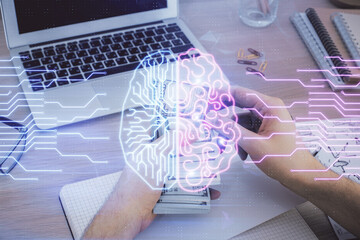 Multi exposure of brain drawing hologram and us dollars bills and man hands. Ai invest concept
