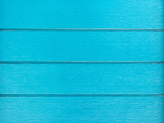Light blue wood texture, wall background surface with a horizontal pattern. Vintage blue timber table top view.