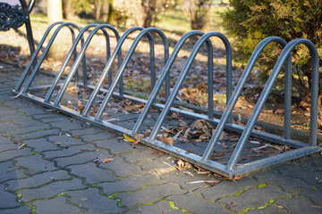 bicycle support. place to park your bike in a public park.