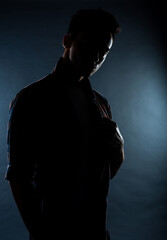 Studio portrait of cool looking young guy