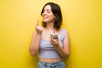 Happy woman with sugar cravings
