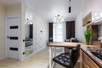 Modern wooden kitchen in a small apartment, apartment interior