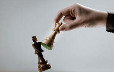 Player defeating his opponent and winning at chess game