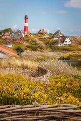 Lighthouse and dwellings at Hörnum, Sylt - Hilly part of the north sea village of Hörnum