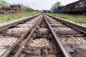 Fototapeta na wymiar Rails at an abandoned rail station in Austria