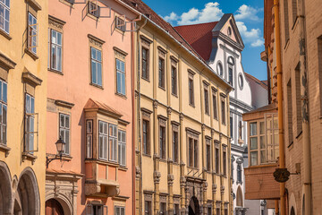 Fototapeta premium Medieval street scene and building facades in the downtown of Sopron, Hungary.