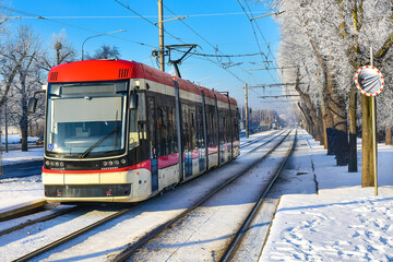 Tram on the street in Gdańsk. Beautiful winter landscape in Poland
