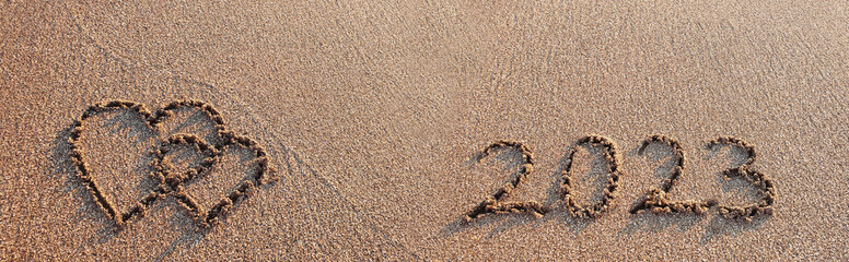 New Year 2023 is coming concept on tropical beach.