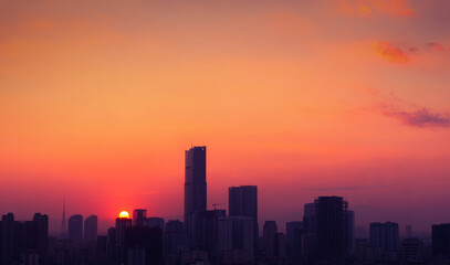 Fototapeta na wymiar Sunset over city. Keangnam tower under the sunset. Hanoi skyline. 
