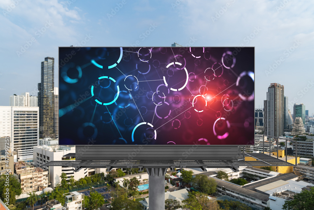 Poster technology hologram on billboard over panorama city view of bangkok. the largest tech hub in southea