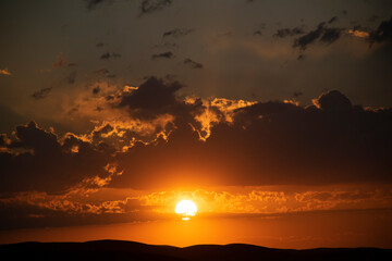 A beautiful sunset in endless fields.
