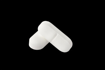 medical pills,on black background,solve health problem