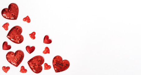 Different hearts in the corner on a white background. Template for Valentines day with copy space.