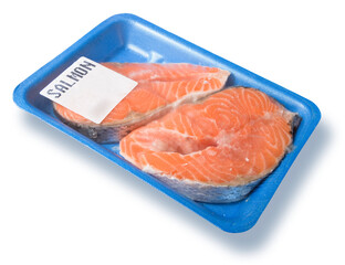 Fresh farmed fish salmon with Omega 3 fatty acids and fish oil benefits for healthy and reduce triglycerides - concept inside a plastic tray with cellophane cover packaging
