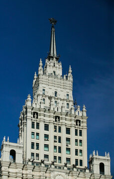 The High-rise building of Ministry of Foreign Affairs of Russia in Moscow on direct sunlight in dark blue sky. One of Stalin skyscrapers.