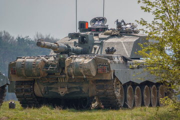 Fototapeta premium main battle tank with gun facing over rear external fuel tanks