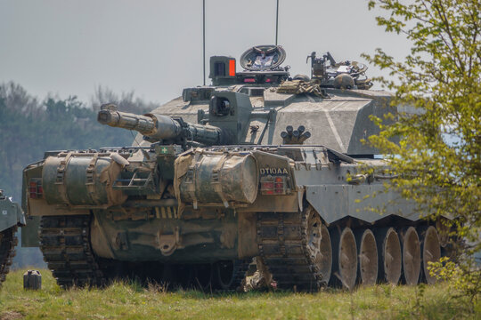 Main Battle Tank With Gun Facing Over Rear External Fuel Tanks