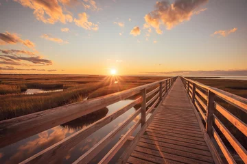 Cercles muraux Descente vers la plage Grays Beach boardwalk in Yarmouth, Massachusetts during sunset with wooden pathway over marsh on coast