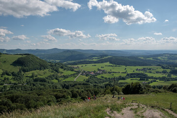 Naklejka premium View from the summit of the hill Pferdskopf in the Rhön to the summit cross.