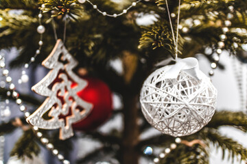 A bauble and a Christmas tree as a holiday decoration.
