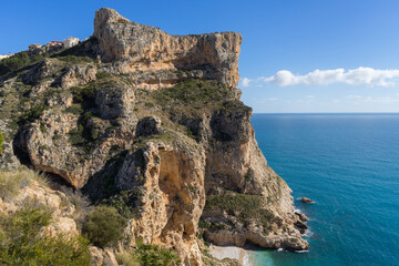 Fototapeta na wymiar cliffs and beautiful beach on the Mediterranean coast in Spain travel destination Costa Blanca