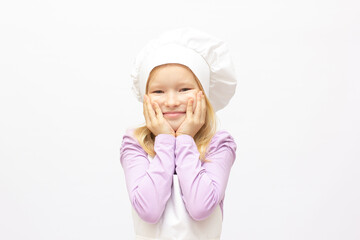 Beautiful little girl in chef uniform isolated on white