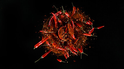 Freeze Motion Shot of Rotating Red Peppers. Top shot.