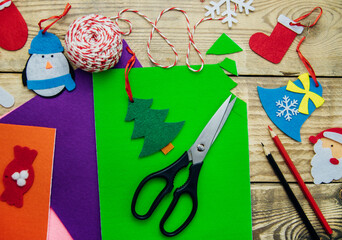 Making handmade Christmas toys from felt with your own hands. Step 2. Cut the toy along the contour.