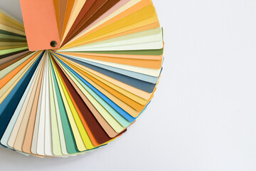 Sample color palette for interior and exterior wall paint on white surface with copy space
